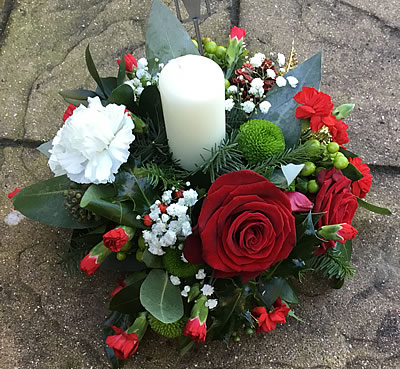 Christmas table flowers with candle, New Forest